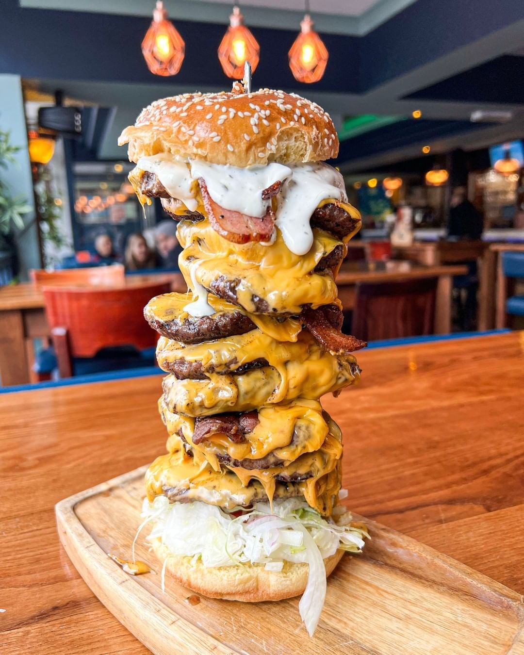 The Manchester Restaurant Serving Whopping 10-Stack Burgers And Cheese-Smothered Hot Dogs